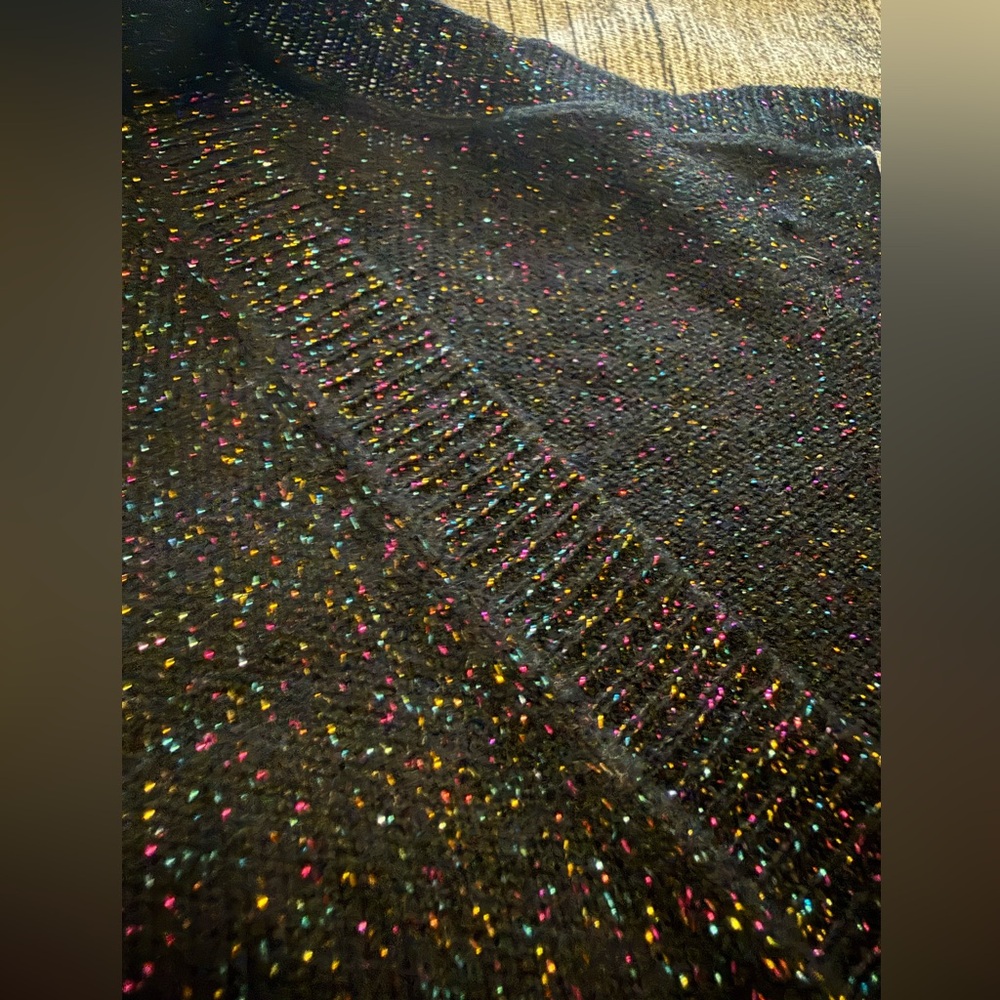 Gorgeous sparkly like new V-neck light sweater. Black with metallic threads